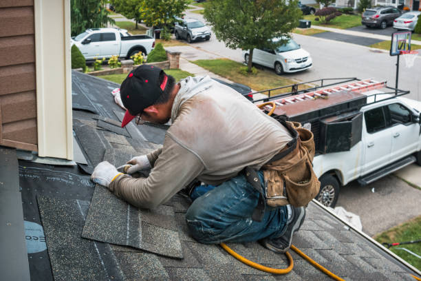 Professional Storm Damage Roof Repair technician working in Tougaloo, MS